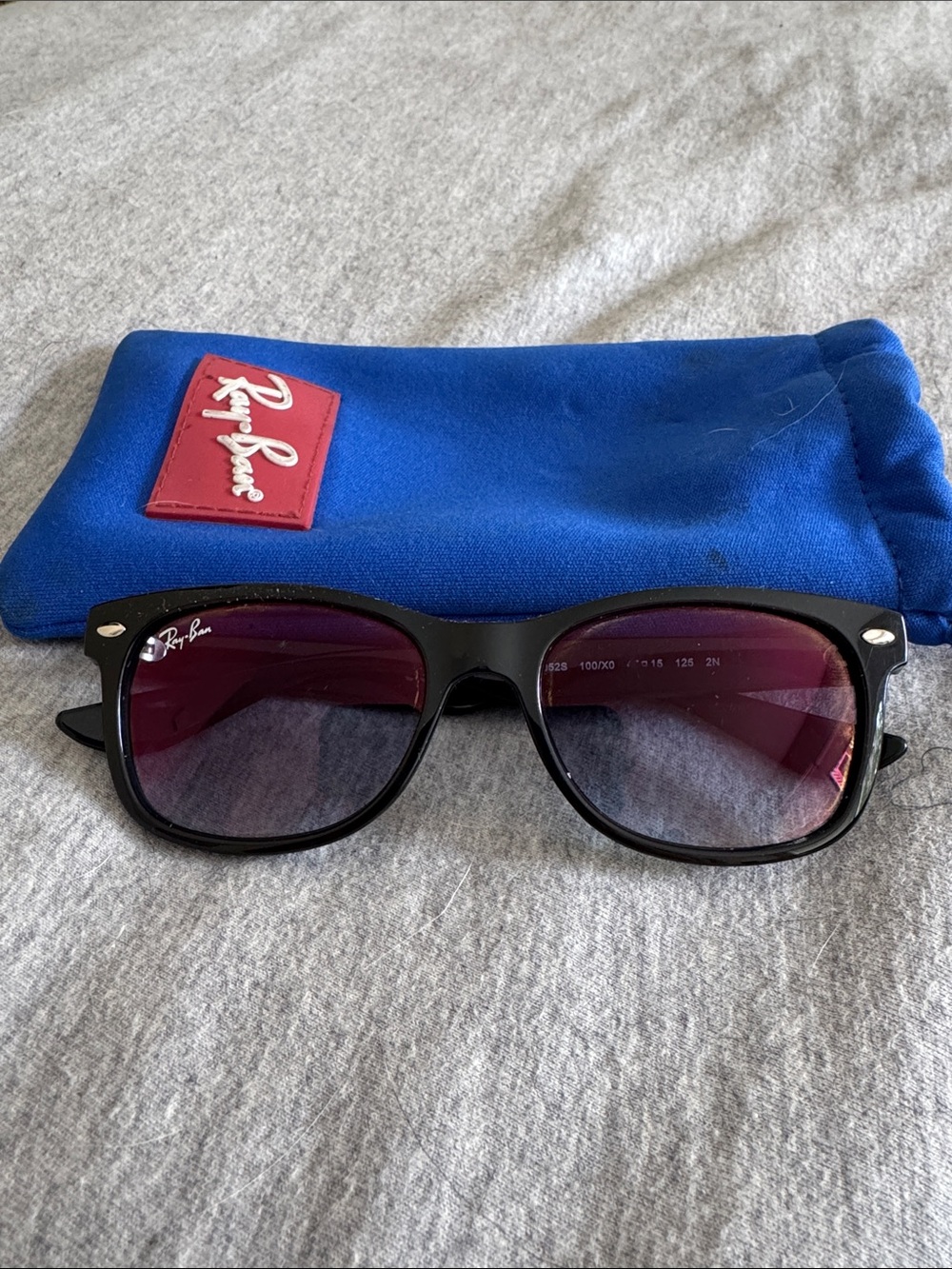 Ray-Ban Kids Black Frame Sunglasses with Purple-Tinted Lenses